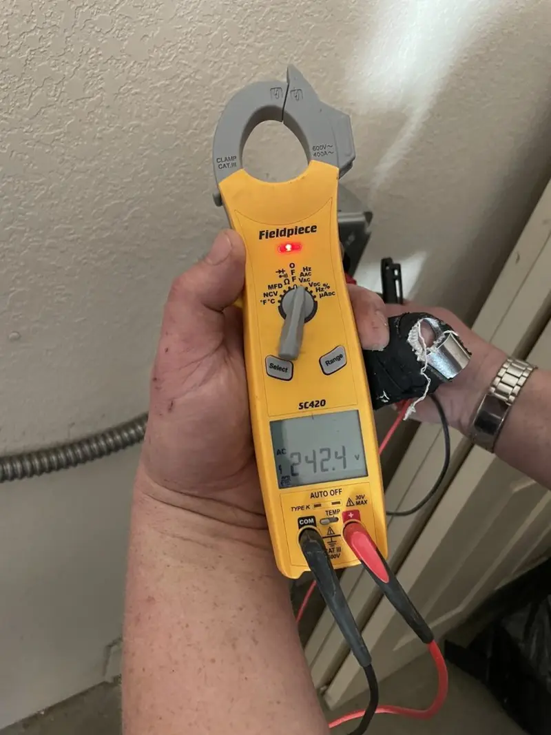 Voltage testing with clamp meter during Circuit Breaker Repair in East Basin